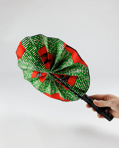 Fan- Collapses for easy storage, made from African wax fabric