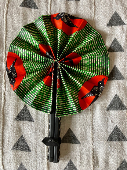 Fan- Collapses for easy storage, made from African wax fabric