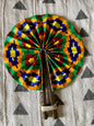 Fan- Collapses for easy storage, made from African wax fabric